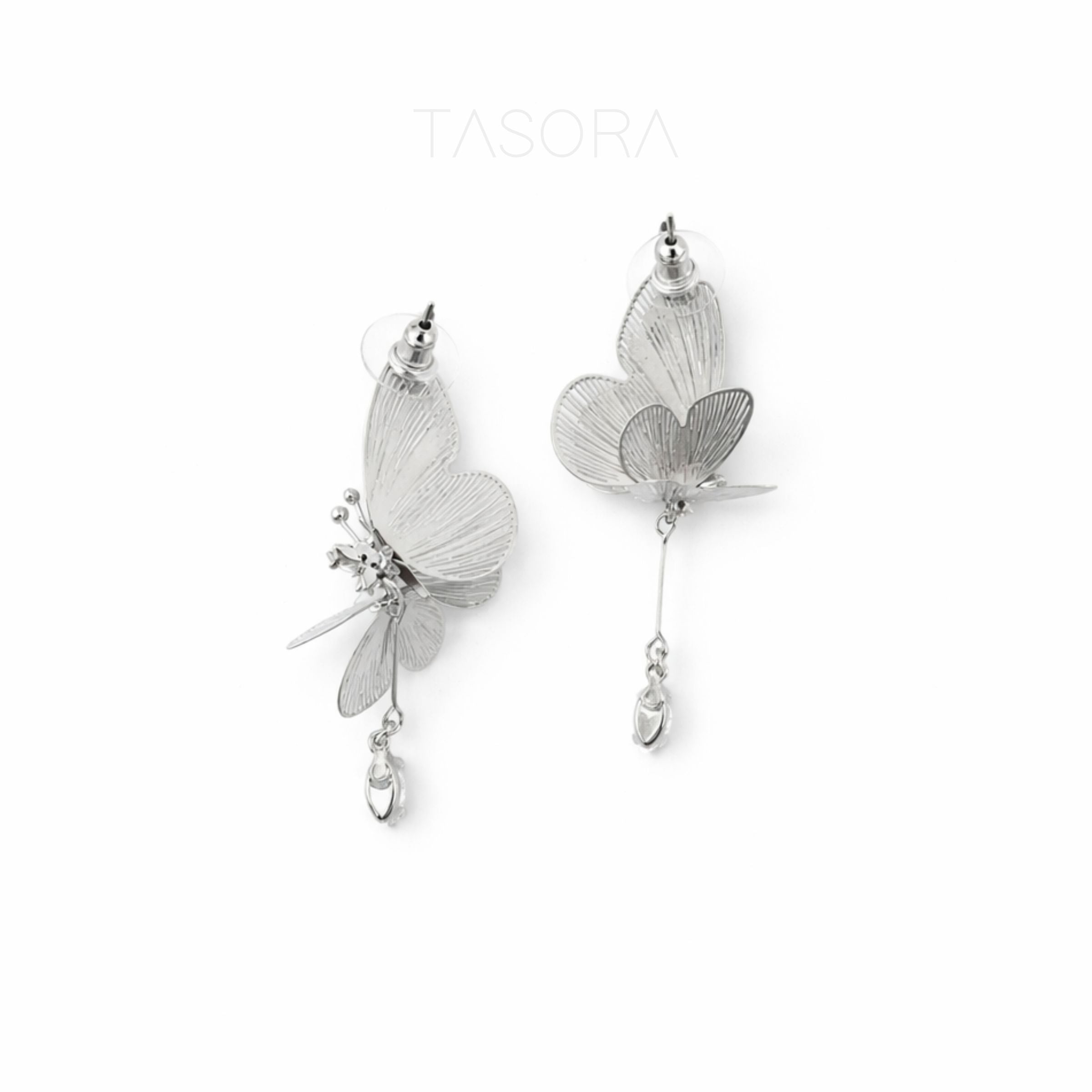 Silver butterfly earrings on a white background with 'TASORA' branding.
