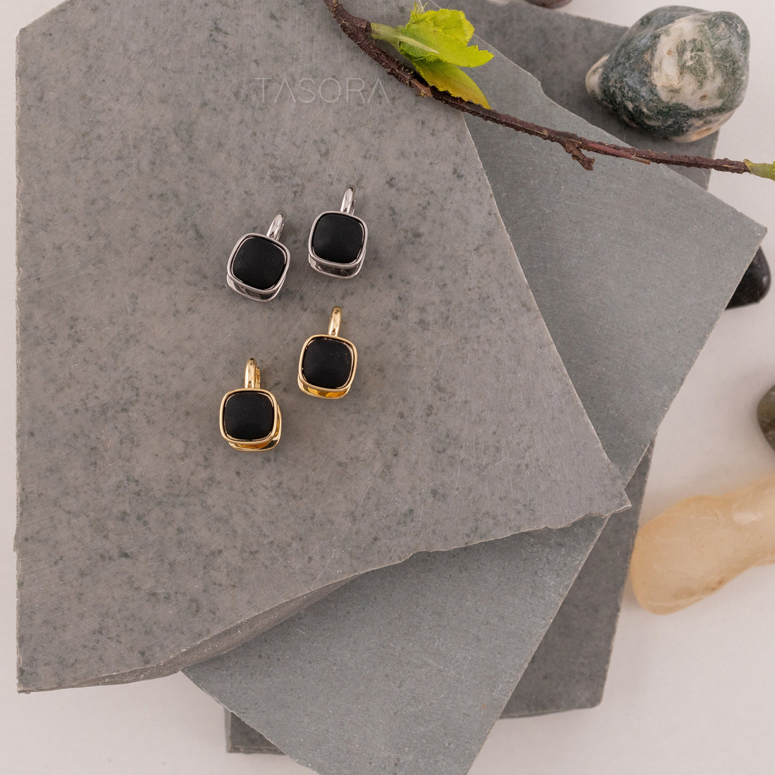 Dusk Dot Silver earrings by TASORA with black stones on gray surface, brand 'TASORA' visible