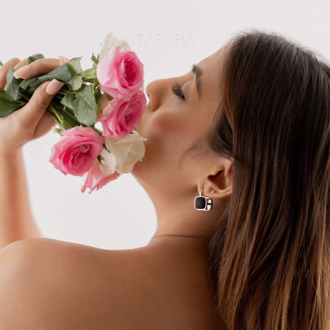 Dusk Dot Silver earrings by TASORA with black stones on gray surface, brand 'TASORA' visible
