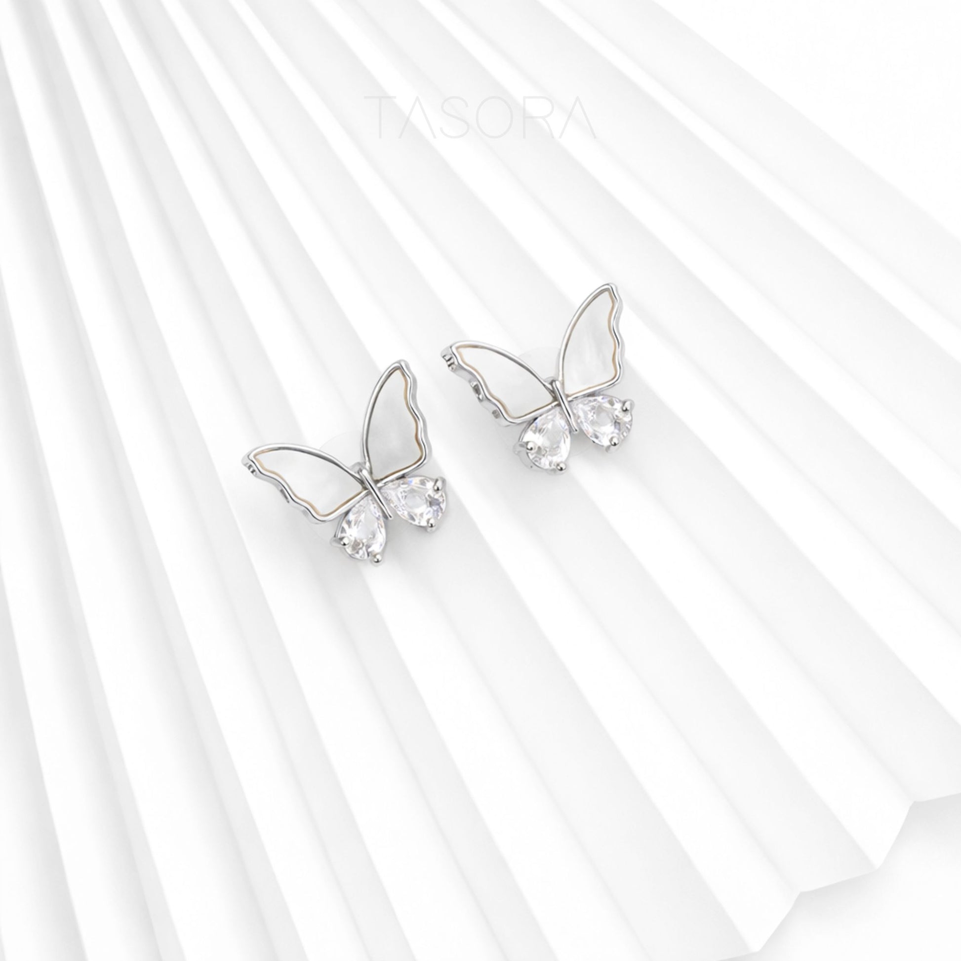 c7d27e30-9f21-4e0d-99f5-288187dc0d5a/Flutter_Wings_Earrings_silver3.jpg