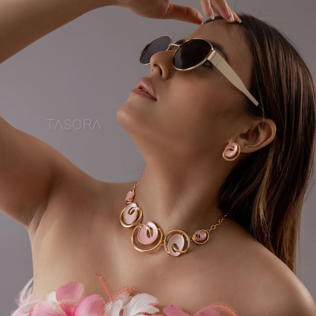 Pastel Swirl Jewelry set with Blush Rose and Saxe Blue colour circular designs on a stone surface with TASORA brand