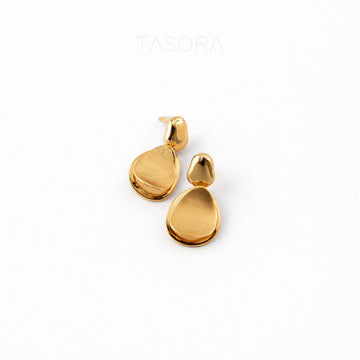 Gold teardrop earrings on a white background with 'TASORA' branding.