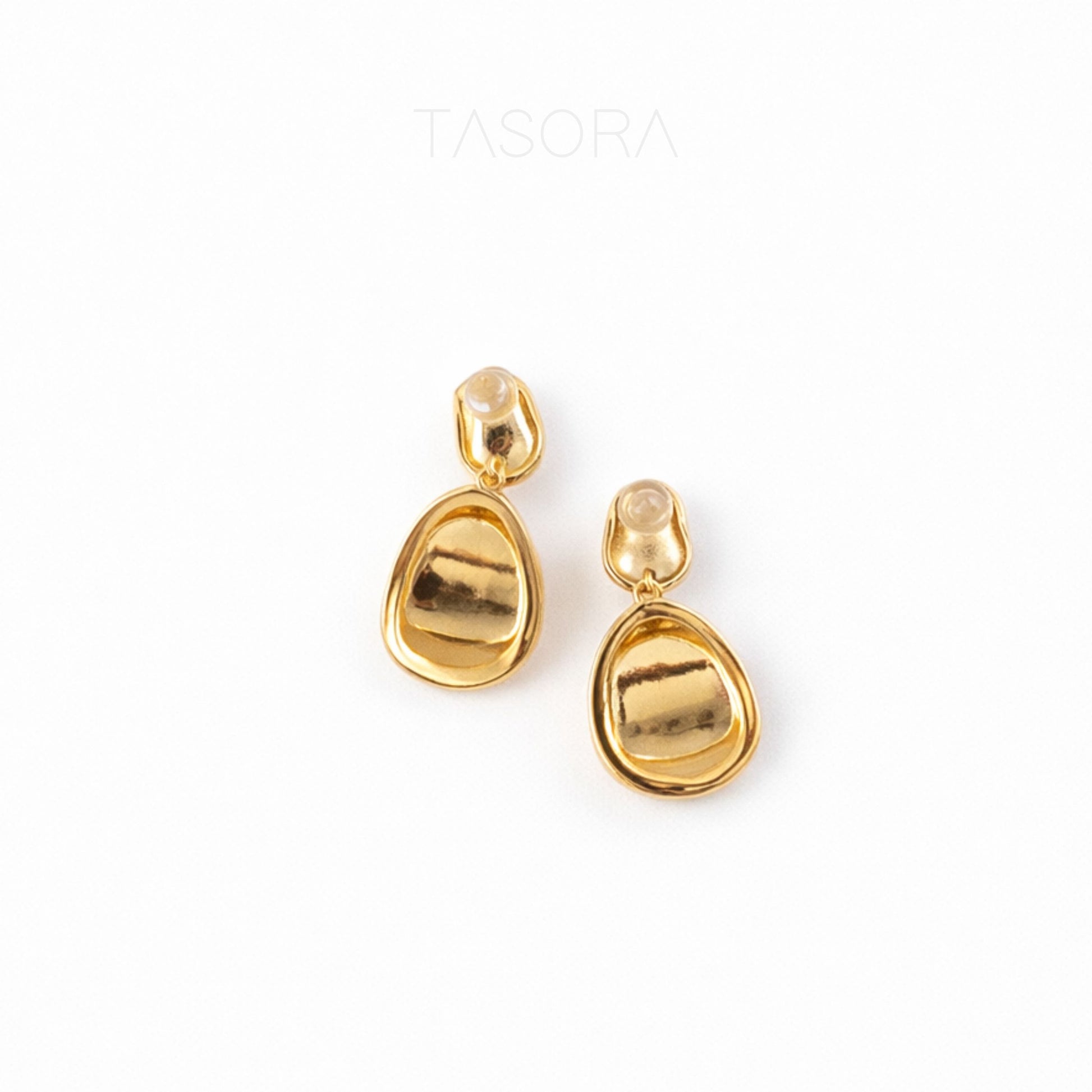 Gold earrings on a white background with 'TASORA' branding.