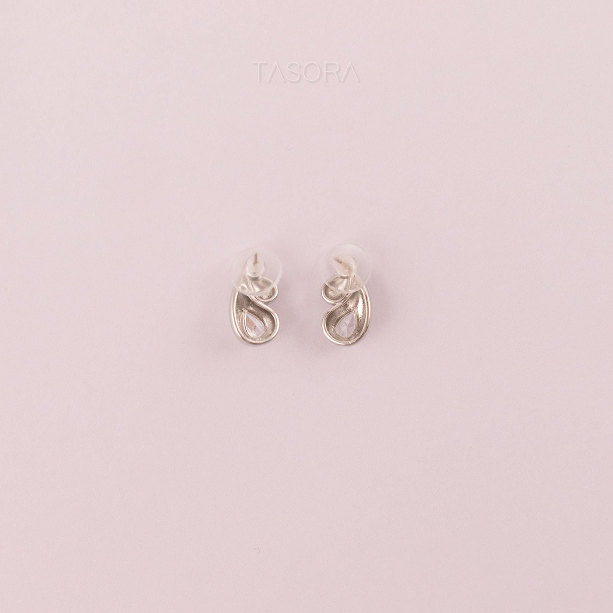 Back Side of Rain Drop Silver earrings on a light natural background