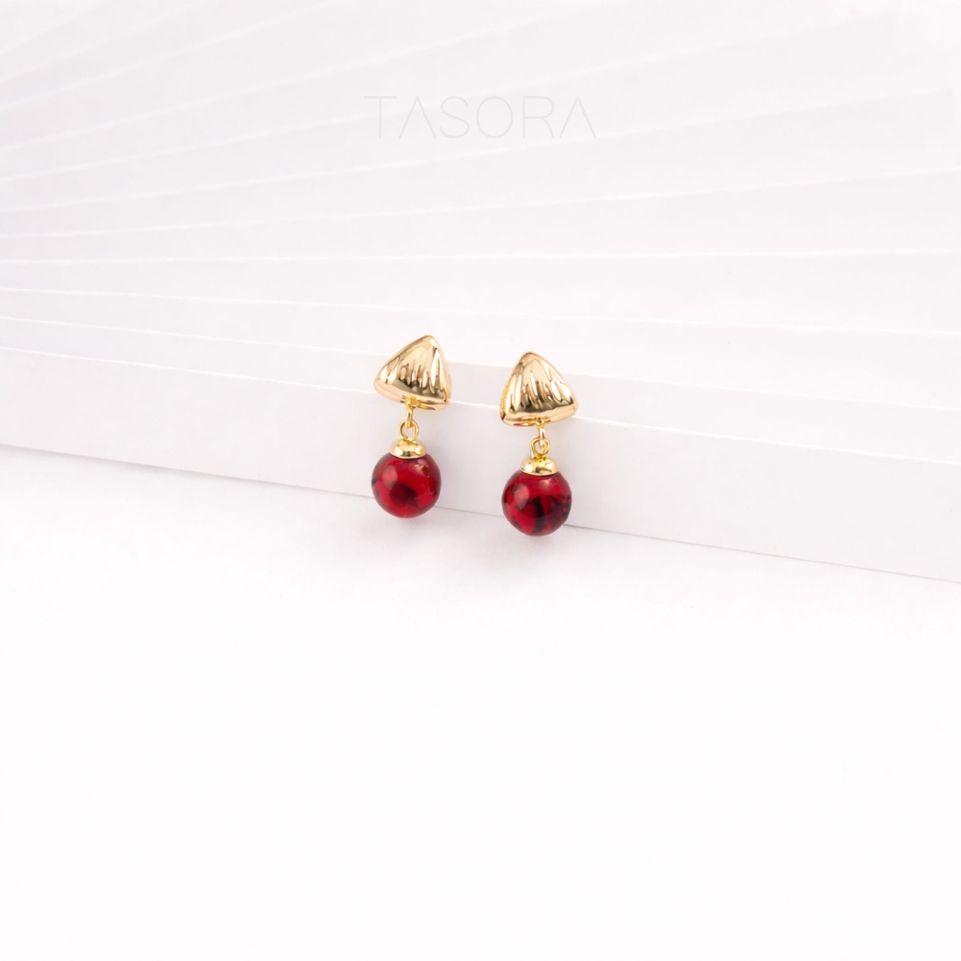55a469c1-bdd1-4d0f-b17f-159626aea5e0/Sona_Halo_Earrings_red3.jpg